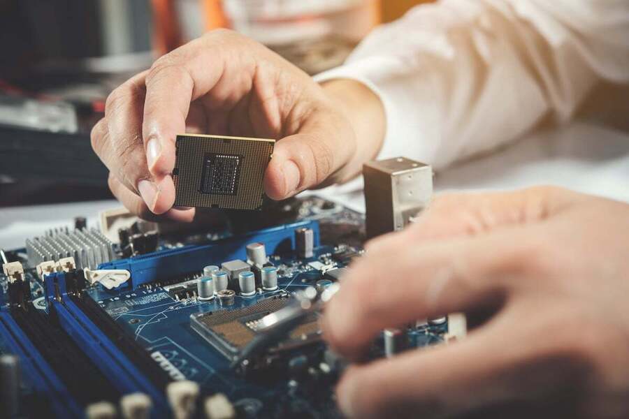 technician-repairing-computer-computer-hardware-repairing-upgrade-technology-1